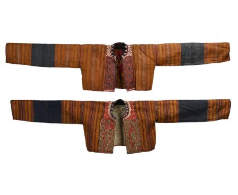 TWO EARLY 20TH CENTURY INDONESIAN KAUER (SUMATRA, LAMPUNG) EMBROIDERED COTTON JACKETS. From striped burnt orange and indigo c