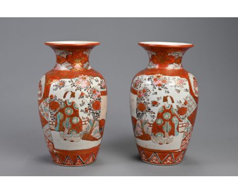 A PAIR OF JAPANESE KUNTANI WARE PORCELAIN VASES, EARLY 20TH CENTURY. Decorated with figures and peacocks on a coral ground wi