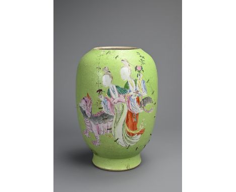 A CHINESE FAMILLE ROSE LIME GREEN GROUND SGRAFFITO VASE, 19TH CENTURY. Lantern form decorated with ladies and qilin. With six