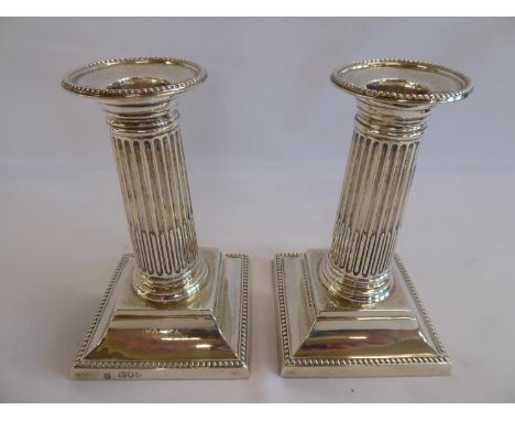 Pair of silver corinthian candlesticks - London 1898 (5" tall)