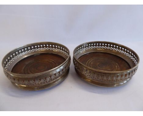 Pair pierced silver bottle coasters - London 1966