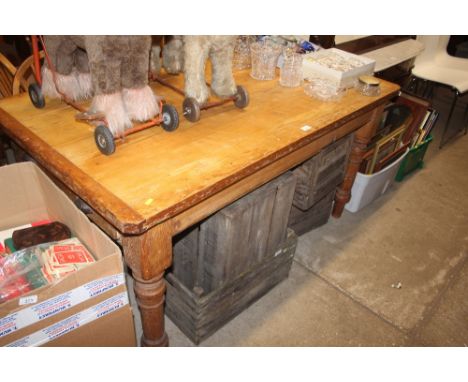 A Victorian pine kitchen table fitted single end drawer; together with a set of six elm seated stick back chairs 