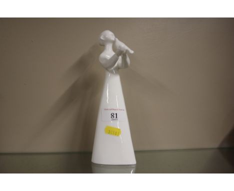 A Royal Doulton white glazed figure "Peace"