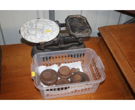 A set of kitchen scales and weights 