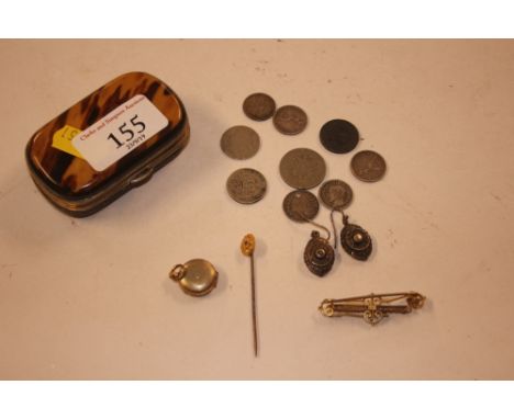 A ladies faux tortoiseshell mounted purse containing a 9ct gold bar brooch; a 15ct gold stick pin; coinage etc. 