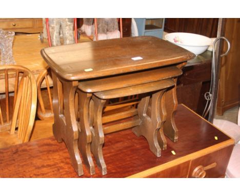 A nest of three Ercol occasional tables 