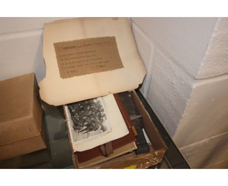 A tray of military related items to include a knife, post-cards, a field message book, a compass etc. 