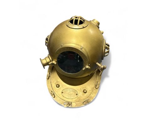 A Brass Diver's Helmet - Anchor Engineering, Karl Heinke - 1921 Munich Germany, Serial No. 04525. In excellent condition.