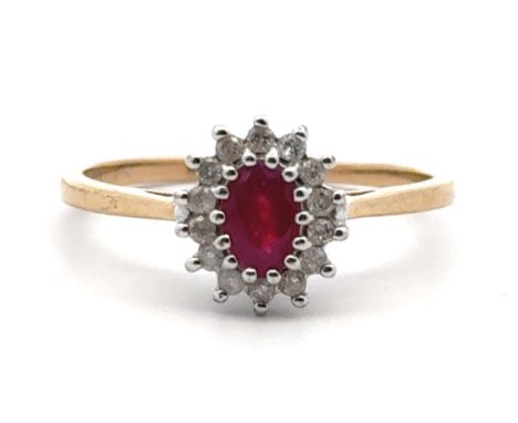 An oval ruby and diamond cluster ring in 9ct gold, size R.&nbsp;2.34g