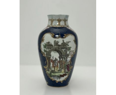 Worcester, a Worcester vase, circa 1770 of baluster form, the blue scale ground reserved with two large gilt-edged panels con