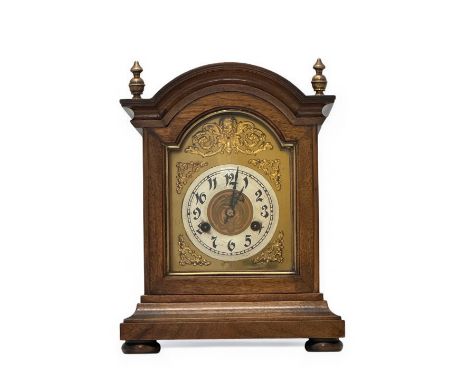 An Edwardian mahogany 'ting tang' mantel clock with Junghans movement marked B05. Height 33cm approx.