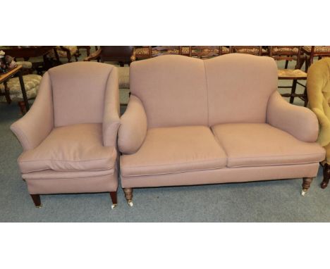 A two piece suite comprising of a two seater sofa and an armchair 