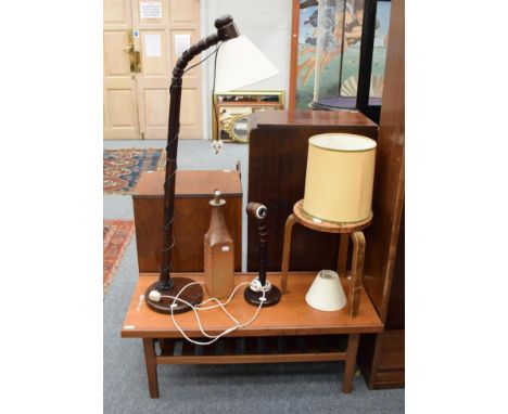 A 1970s Swedish Solbackens Svarveri standard lamp and table lamp; a ceramic lamp; a teak coffee table; and a Finmar stool 