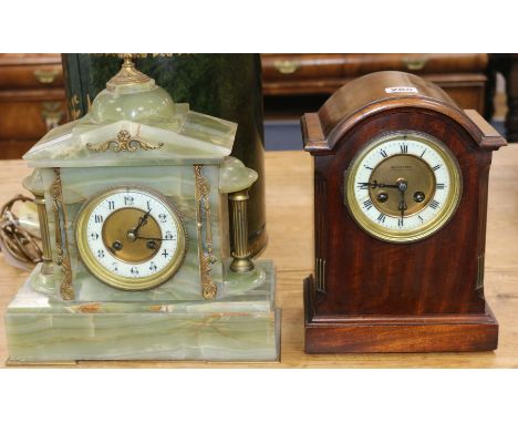 An onyx and gilt metal mantel clock and a mahogany mantel clock