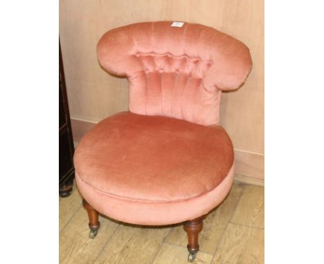 A Victorian pink button back nursing chair
