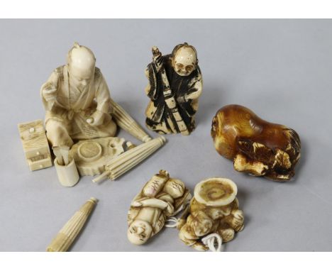 A quantity of Japanese ivory netsuke