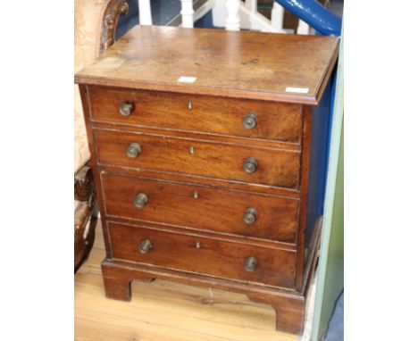A late George III mahogany two drawer chest, converted from a commode, W.64cm
