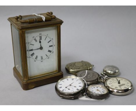 A collection of pocket watches and a carriage clock