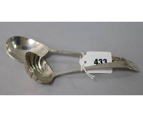 An Edwardian Irish silver sauce ladle and a late silver apostle spoon.
