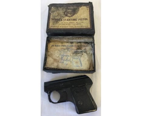 A Webley starting pistol with original box and instruction leaflet. Box and leaflet a/f. 