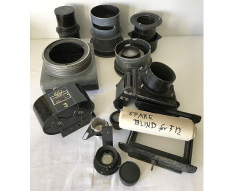 A quantity of original WW2 Spitfire reconnaissance camera parts. Comprising:- camera body, 2 lens cones, AM Universal shutter