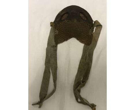 WWI leather and chain Tankers mask with fabric straps. Light rust. 