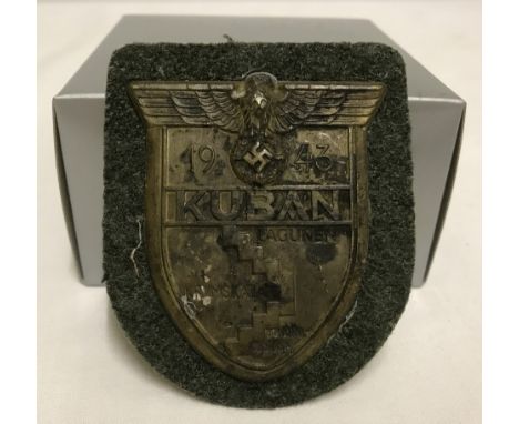 A WWII German Krim War Shield on army backing, dated 1943.  
