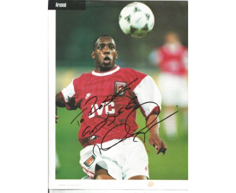 Football Ian Wright signed 12x8 colour magazine photo pictured in action for Arsenal. Good Condition. All autographs are genu