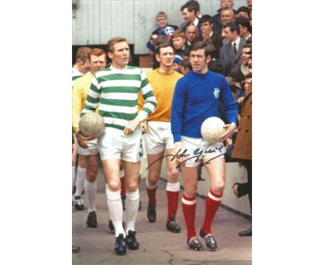 JOHN GREIG 1969, football autographed 12 x 8 photo, a superb image depicting the Rangers captain and his counterpart from Cel
