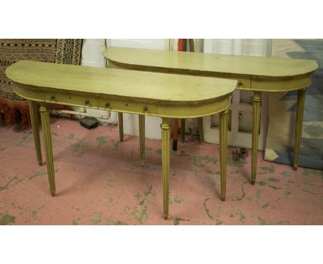CONSOLE TABLES, a pair, late 19th/early 20th century painted and parcel gilt with two frieze drawers and fluted tapering supp