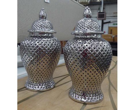 TEMPLE JARS, a pair, with covers, contemporary perforated ceramic design, 64cm H. (2) 