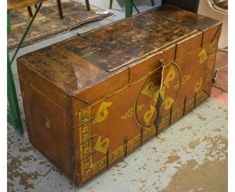 TRUNK, 19th century Tibetan painted and iron bound with a central rising top section and decoration to the front, 110cm W x 5