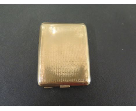 A George V 9ct gold vesta case having engine turned decoration to front and rear with engraving to interior reading - Le Touq