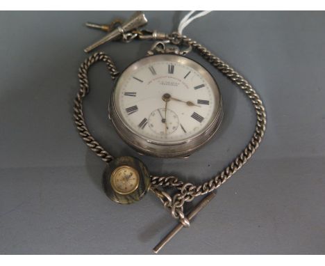 A silver hallmarked open faced pocket watch, Roman numerals to white enamel dial with subsidiary second hand dial bearing - T