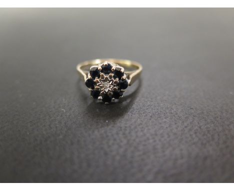 A 9ct gold sapphire and diamond cluster ring - Hallmarked Birmingham - Ring size M - Weight approx 2.0gms
Condition Report: G