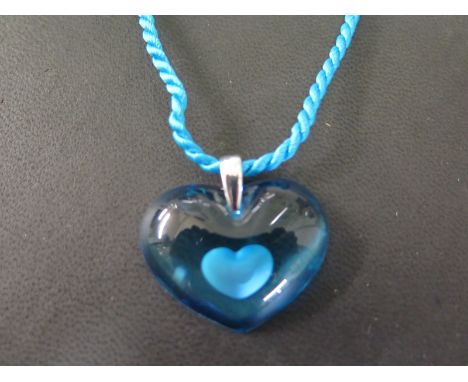 A Lalique crystal and silver Tendre Coeur Heart pendant, colour light blue 
Condition report:  Unworn with original box and p