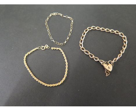 Three bracelets - All with marks indicating 9ct gold - Lengths approx 17.5cms - Total weight approx 15.9gms
Condition Report: