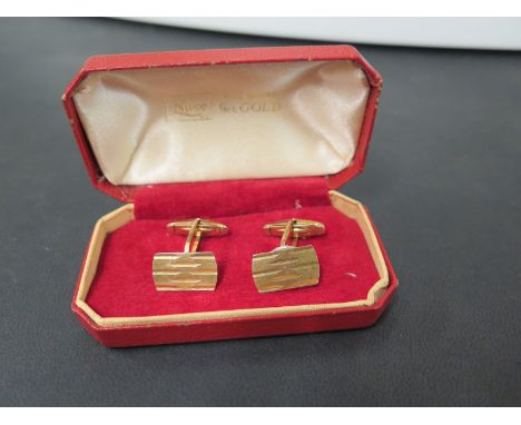 A pair of 1960s 9ct gold textured cufflinks - With swivel-back fittings - Hallmarked Birmingham, 1965 - Weight approx 5.3gms
