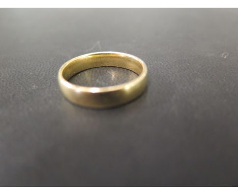 An 18ct gold band ring - Hallmarked Sheffield - Ring size W - Weight approx 6.9gms
Condition Report: Good - With light surfac