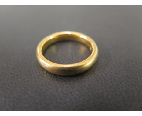 A 22ct gold band ring - Hallmarked Birmingham - Ring size N - Weight approx 7.9gms
Condition Report: Good - With light scratc