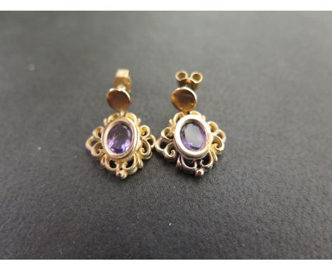 A pair of amethyst ear pendants - Butterflies stamped 375 - Length approx 1.5cms - Weight approx 2.6gms
Condition Report: Goo