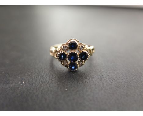 A sapphire and diamond openwork cluster ring - Tests as higher carat gold - Ring size O - Weight approx 2.6gms
Condition Repo