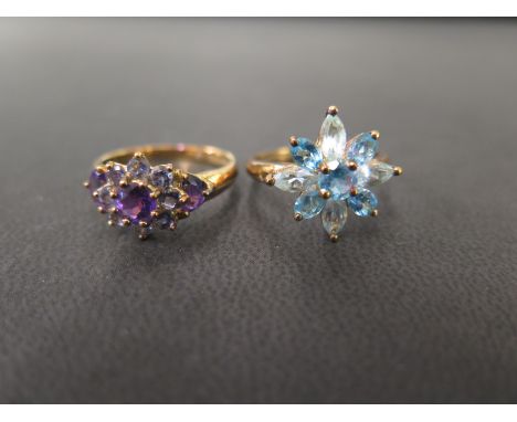 Two cluster rings - To include topaz and amethyst - Both hallmarked Birmingham - Both size O - Total weight approx 5.0gms
Con