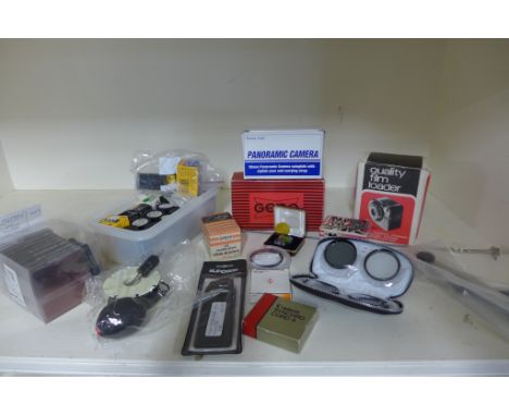 One x 35mm film loader, 2 x shutter release panoramic camera, ten Cokin filters etc