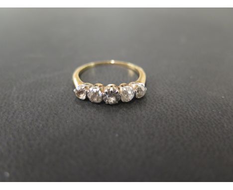 An old-cut diamond five-stone ring - Estimated total diamond weight 1.0ct - Stamped 18ct - Ring size M - Weight approx 2.2gms