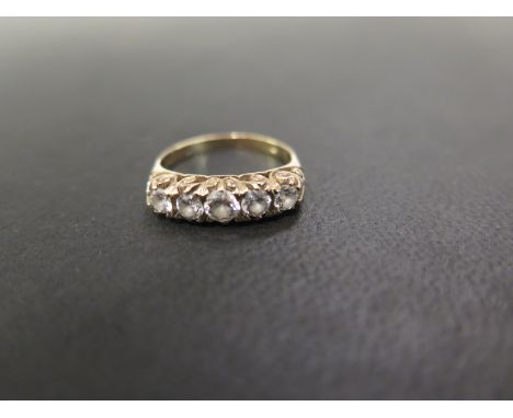 A 9ct gold cubic zirconia five-stone ring - Hallmarked London - Ring size L - Weight approx 2.3gms
Condition Report: Good - W