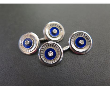 A pair of diamond and enamel cufflinks - Stamped 18K - Weight approx 10.2gms
Condition Report: Good - With light scratches - 