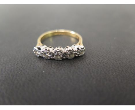 A brilliant-cut diamond five-stone ring - Stamped 18ct ad plat - Ring size O 1/2 - Weight approx 3.5gms
Condition Report: Goo