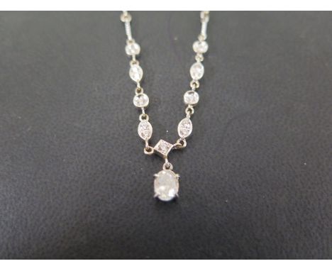 A diamond necklace - The oval diamond drop to the brilliant-cut diamond collets and fancy-link chain - Principal diamond esti