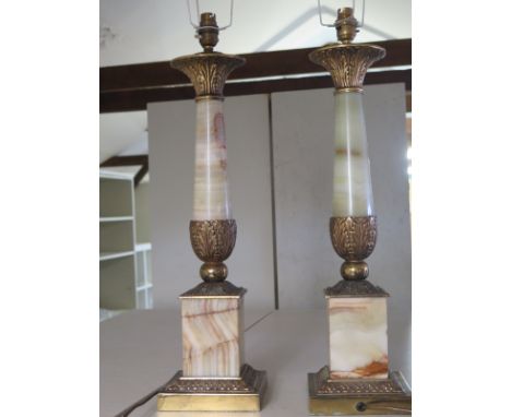 A pair of onyx lamp stands with brass fittings with square bases - Height 60cm - as new